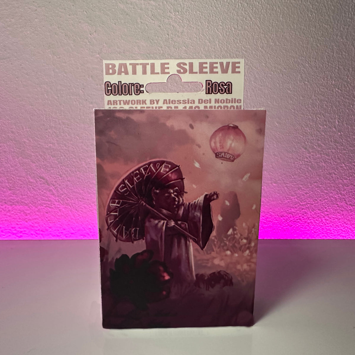 Battle Sleeves Saifu colore Rosa, artwork di Alessia Del Nobile